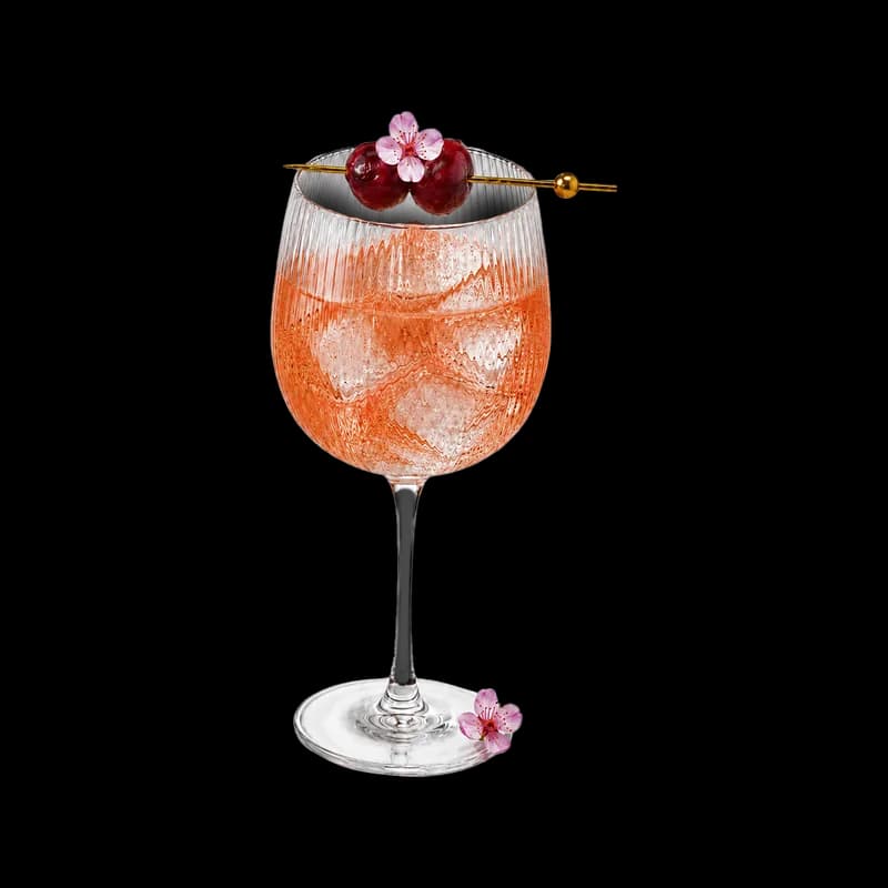 Cherry Blossom Spritz in a ribbed wine glass with cherries on a pick, at Bloom cocktail bar, Park Street, Bristol