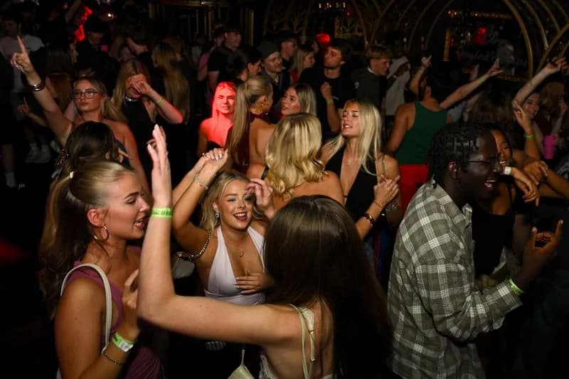 A crowd of students dancing at a society social in the nightclub at Bloom, Park Street, Bristol